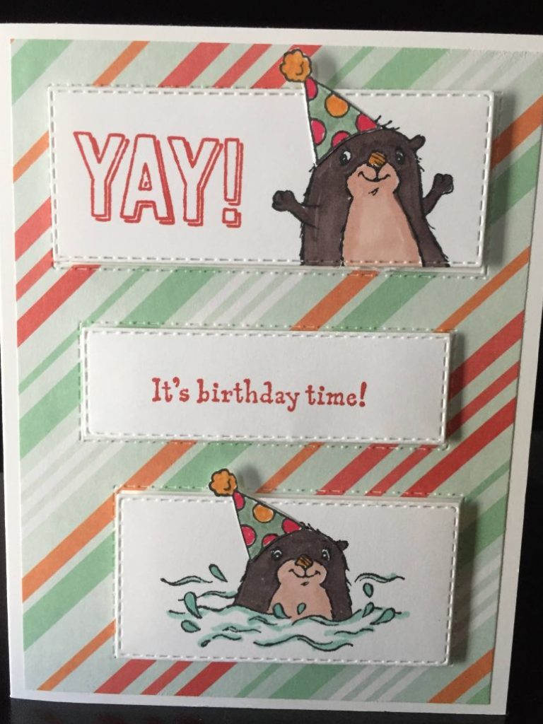 Vertical die cut card with otters