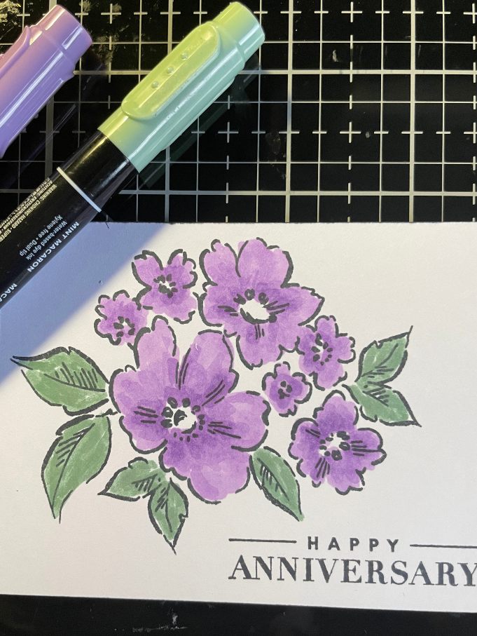Coloring stamped image with dye based markers
