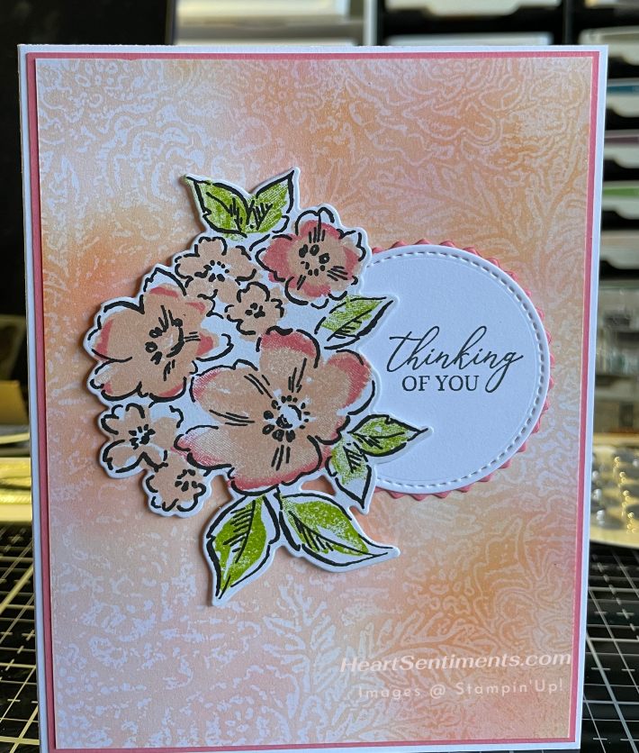 Floral card with an embossed wax resist background